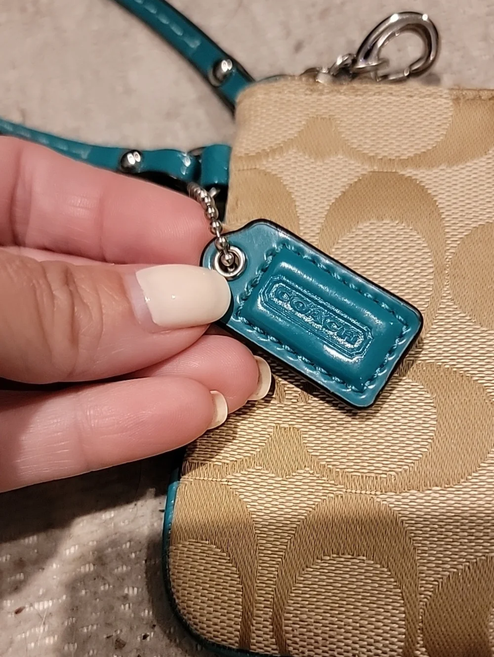 Coach Tan Signature Canvas Wristlet with Jade Green Stripe And Leather Trim